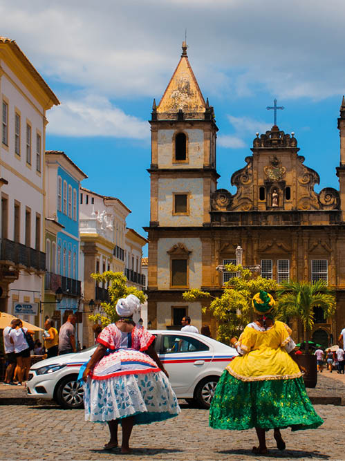 Bright view of Pelourinho in Salvador, Brazil, dominated by the large colonial Cruzeiro de Sao Francisco Christian stone cross in the Pra a Anchieta, America