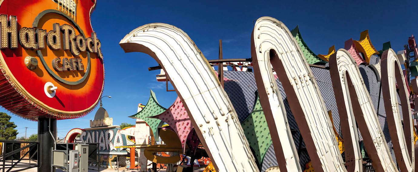 LAS VEGAS, NV - JUNE 27, 2019: Panoramic view of The Neon Boneyard Park. It is an outdoor museum displaying old retired signs from Las Vegas hotels and casinos and a main attraction in the city.
