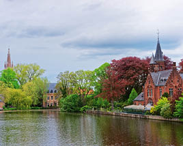Minnewaterpark and Minnewater lake in the old town of Brugge, Belgium.