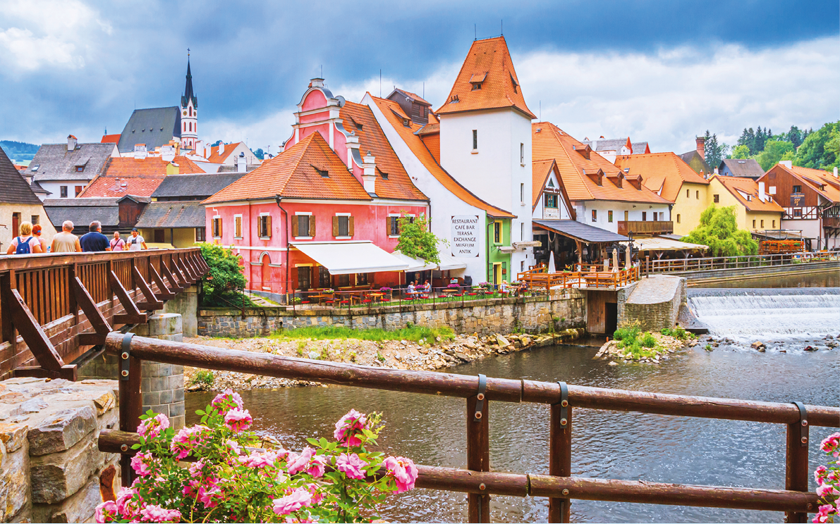 Summer cityscape - view of the Old Town of Cesky Krumlov and the Vltava river flowing through it, Czech Republic