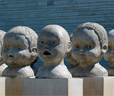 TALLINN, ESTONIA - JULY 7, 2017: Square of Dolls by Estonian sculptor Jass Kaselaan, exhibited in Kumu Art Museum of Estonia.