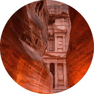 Petra by night, Jordan. The symbol of Petra, the Treasury and the Siq canyon illuminated by candle lights