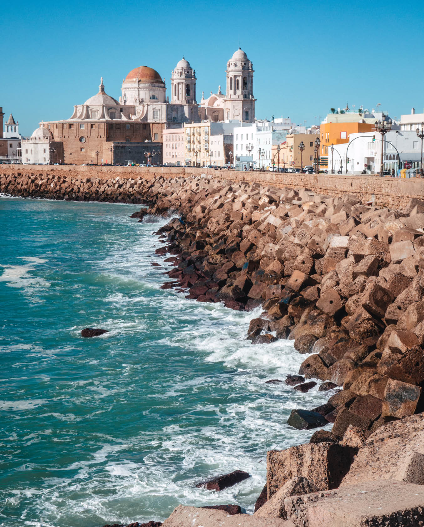 The seafront promenade of Cadiz with the Cathedral in the Background. Andalusia, Spain.