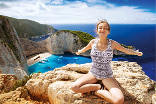 Traveler on the Background Incredible Navagio Beach or Shipwreck Beach. Zakynthos, Greece.