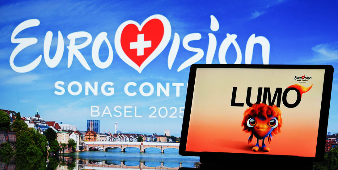 Bavaria. Germany - March 24, 2025: Eurovision Song Contest 2025 logo and talisman seen displayed on a tablet and monitor 