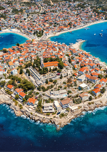 Aerial view of Primosten old town on the islet, Dalmatia, Croatia. Primosten, Sibenik Knin County, Croatia. Resort town on the Adriatic coast. Aerial view of adriatic town Primosten, Croatia