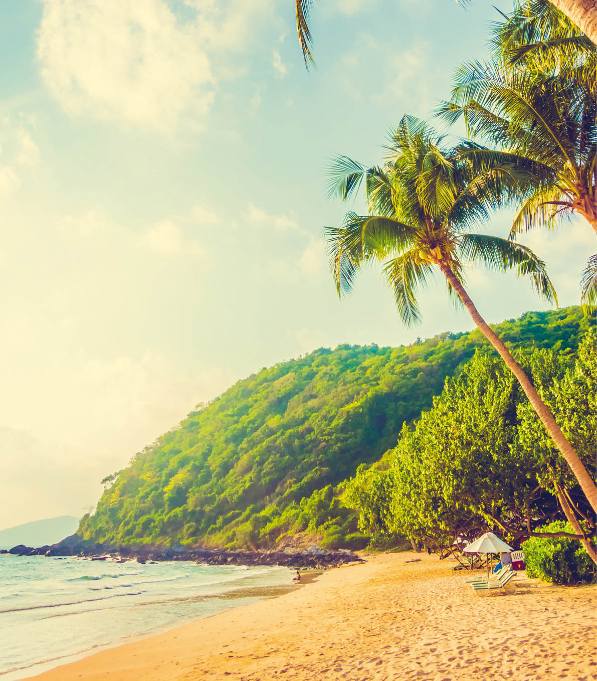 Beautiful tropical beach and sea landscape with coconut palm tree and umbrella and chair - Vintage Filter and Boost up color Processing