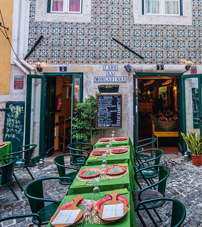 Lisbon, Portugal - October 9, 2018: Exterior of Fado restaurants in Alfama area of Libson