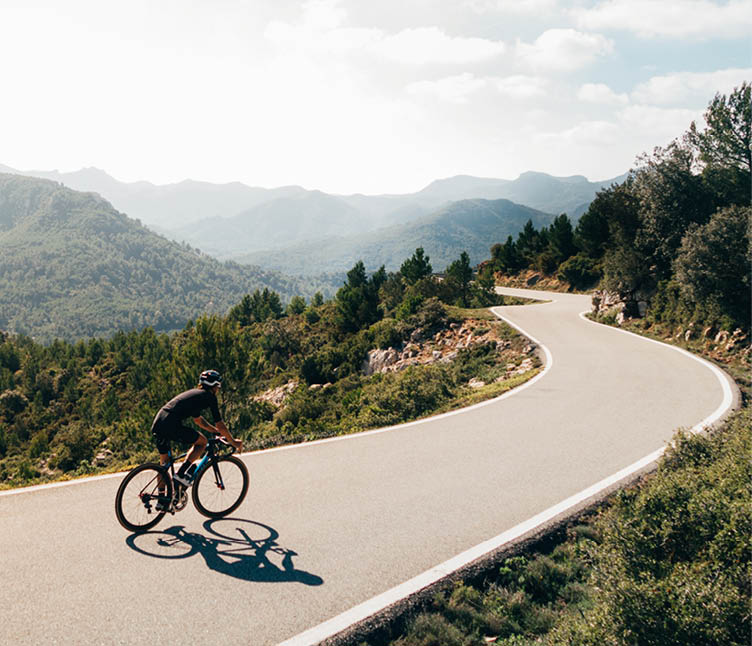 silhouette of the cyclist riding a road bike at sunset.Mountain bicycle and man.Life style outdoor