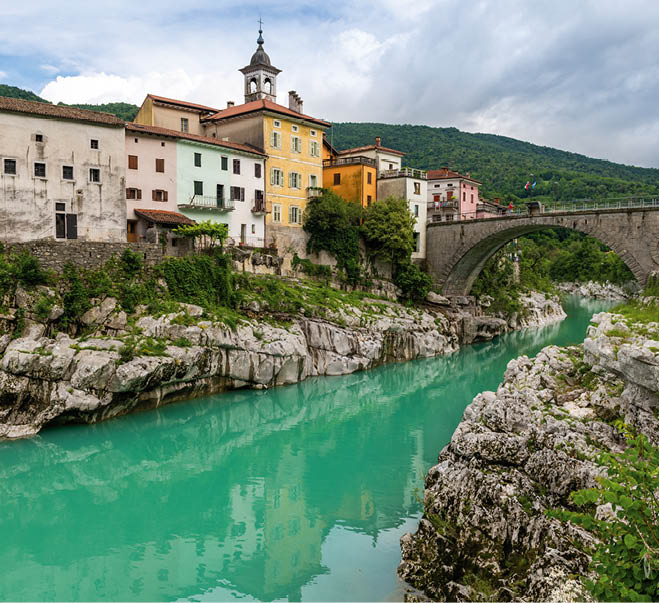 Picturesque Kanal na Soci Town by the Soca River in Summer