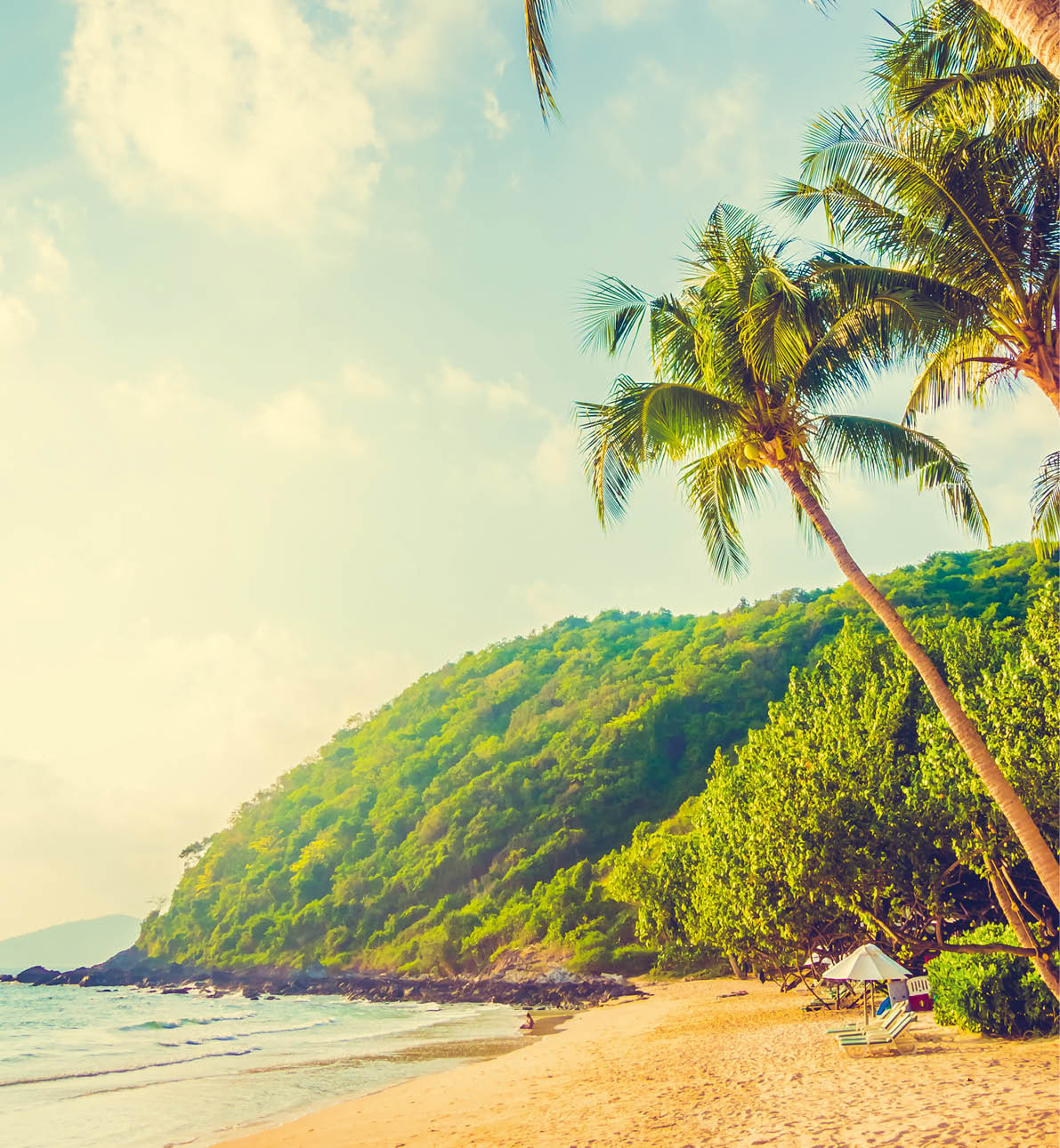 Beautiful tropical beach and sea landscape with coconut palm tree and umbrella and chair - Vintage Filter and Boost up color Processing