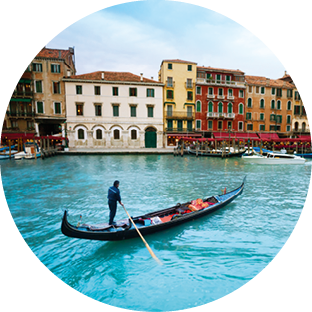 Gondolier in gondolla on the Grand canal in Venice, Itally