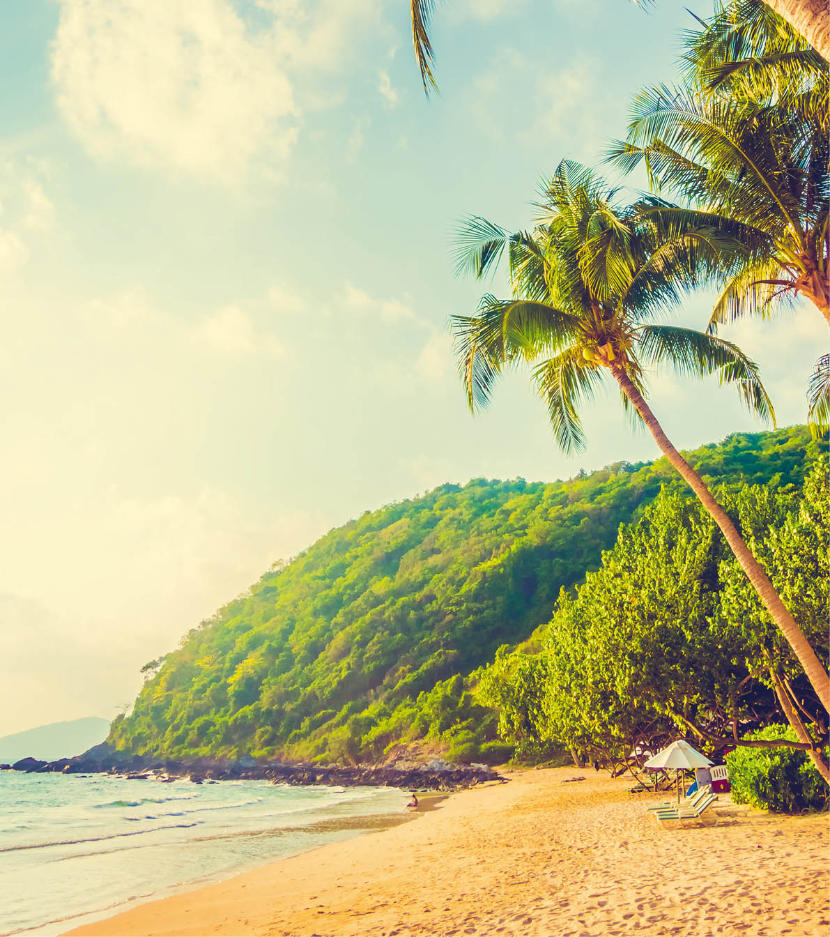 Beautiful tropical beach and sea landscape with coconut palm tree and umbrella and chair - Vintage Filter and Boost up color Processing