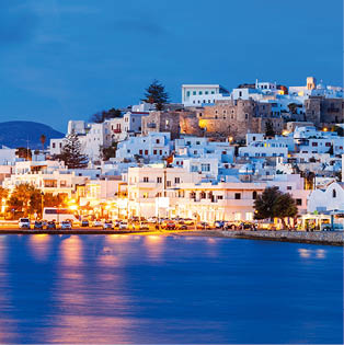 Naxos island aerial panoramic view at night. Naxos is the largest of the Cyclades island group in the Aegean, Greece
