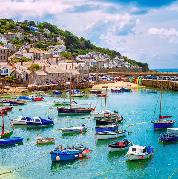 Mousehole village and fishing port in Cornwall, England, United Kingdom. Mousehole lies within the Cornwall Area of Outstanding Natural Beauty