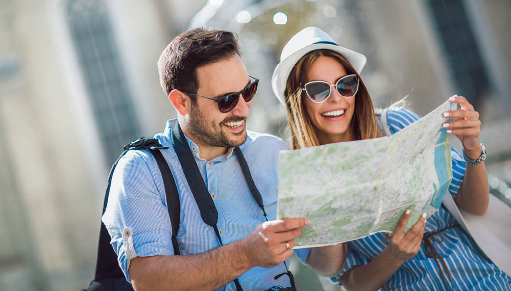 Tourist couple in love enjoying city sightseeing