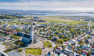 Reykjavik Iceland city scape frop the top with Hallgrimskirkja church. Aerial photo. religious building