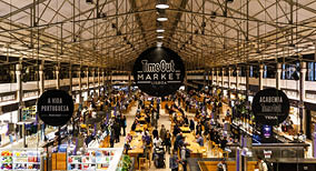Lisbon, Portugal - November 20 2021: Interior view of the Time Out Market Lisboa, a trendy food hall located in the Mercado da Ribeira at Cais do Sodr in Lisbon, Portugal.