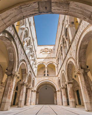 Arched inner courtyard in Sponza Palace in Dubrovnik Old Town, Croatia