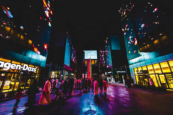 A crowd walking through Riyadh Boulevard