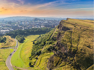 Cityscape of Edinburgh from Arthur's Seat in a beautiful summer day, Scotland, United Kingdom