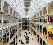EDINBURGH, SCOTLAND - JULY 17, 2016: Grand Gallery of the National Museum of Scotland. It was renovated in 2011