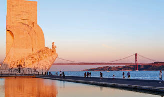 Portugal, Lisbon, Belem, Padrao dos Descobrimentos (Monument to the Discoveries) with the 25th April Bridge behind
