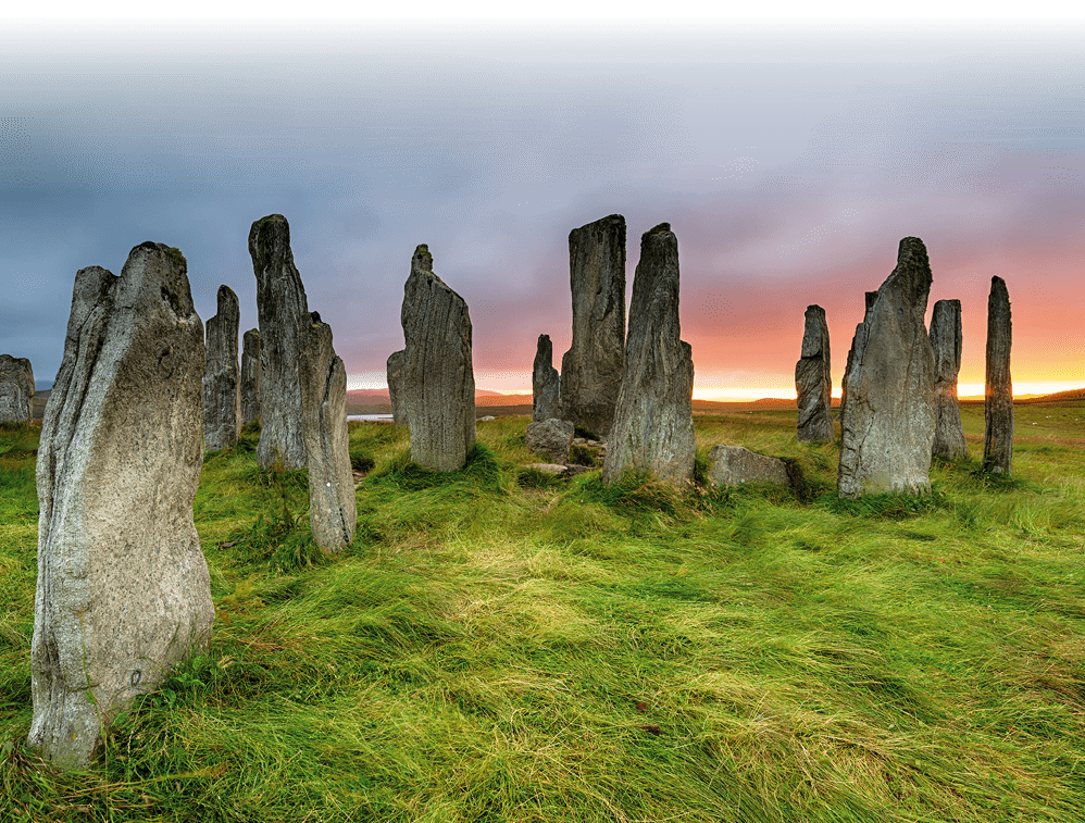 Stormy sunset over the Callanish Stones on the Isle of Lewis in the Outer Hebrides of Scotland