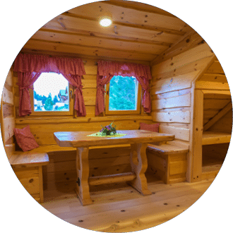 The interior of a log cabin accommodation at Lake Bloke, Nova Vas, Slovenia