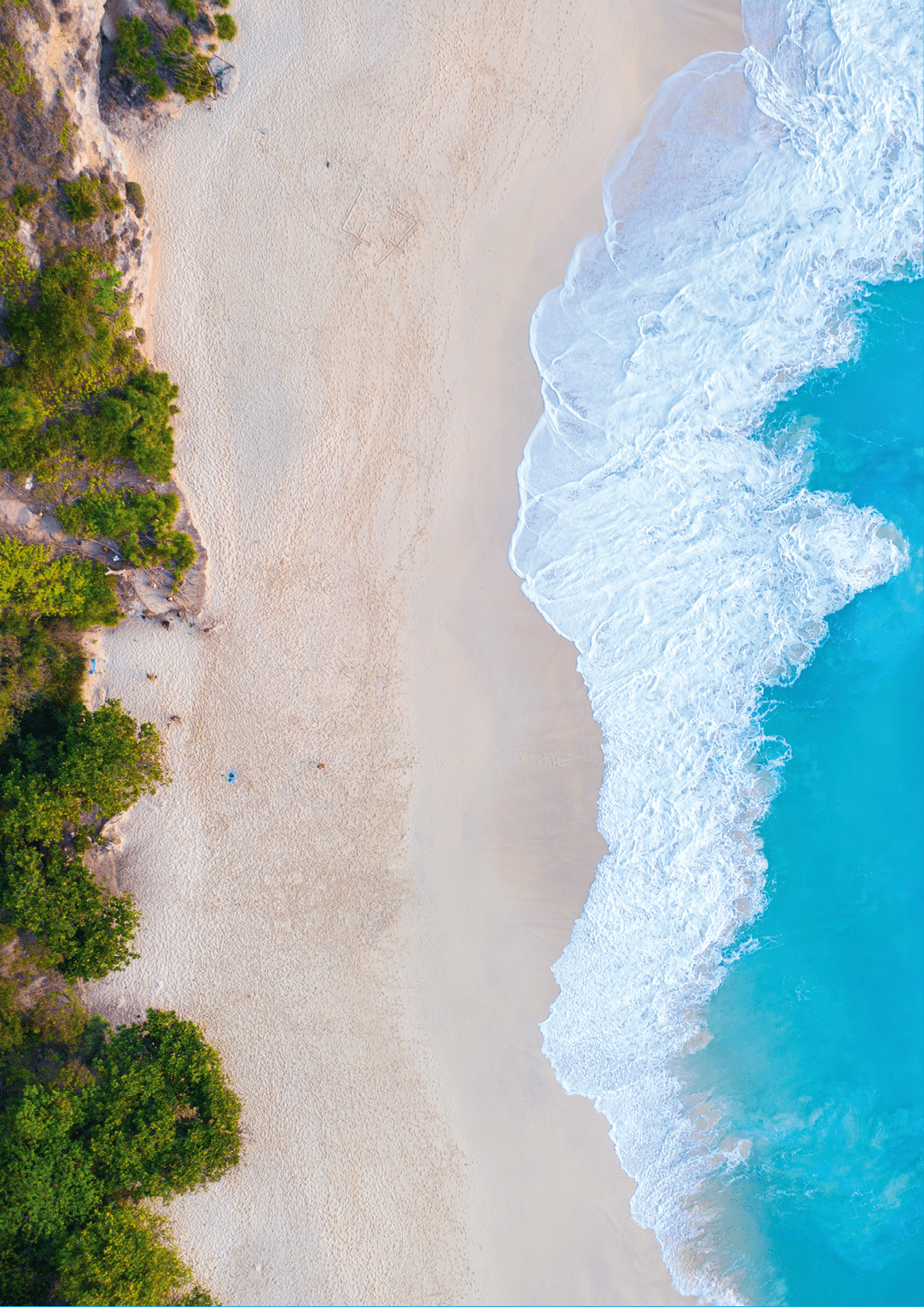 Aerial view of Kelingking Beach in Nusa Penida island, Bali in Indonesia.