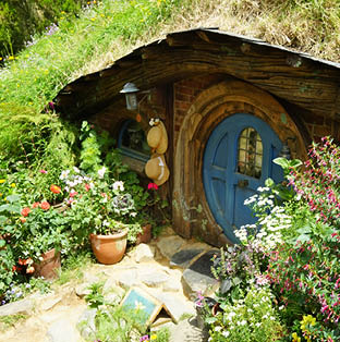 A wide shot of the Hobbiton movie set in Matamata New Zealand