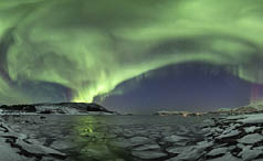 A panorama of the sea under unique colors covering the sky in Lofoten, Norway