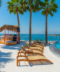 ANTALYA, TURKEY: Beautiful territory of Fosforlu beach on a sunny day on the Mediterranean coast in Antalya, Turkey